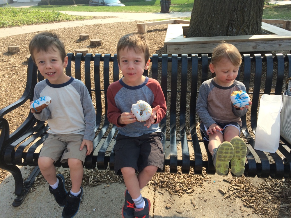 Enjoying doughnuts at the park on a beautiful spring day!
